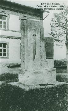 Former Livu Parish House and a monument to the memory of the first battle of the Cēsis Regiment's student company on June 6, 1919. The monument was unveiled in 1930. The architect was a former student company soldier, Kārlis Dzirkalis. Source: Cēsis Museum of History and Art
