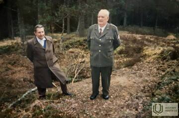 Former bunker residents at the site of the "Dagger Bunker" in 2001 - on the left Jānis Pirtnieks, on the right - Jānis Tilibs.